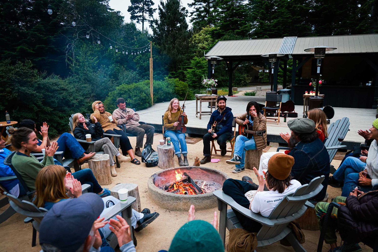 Guests seated at a long farm table at a Mendocino County dinner