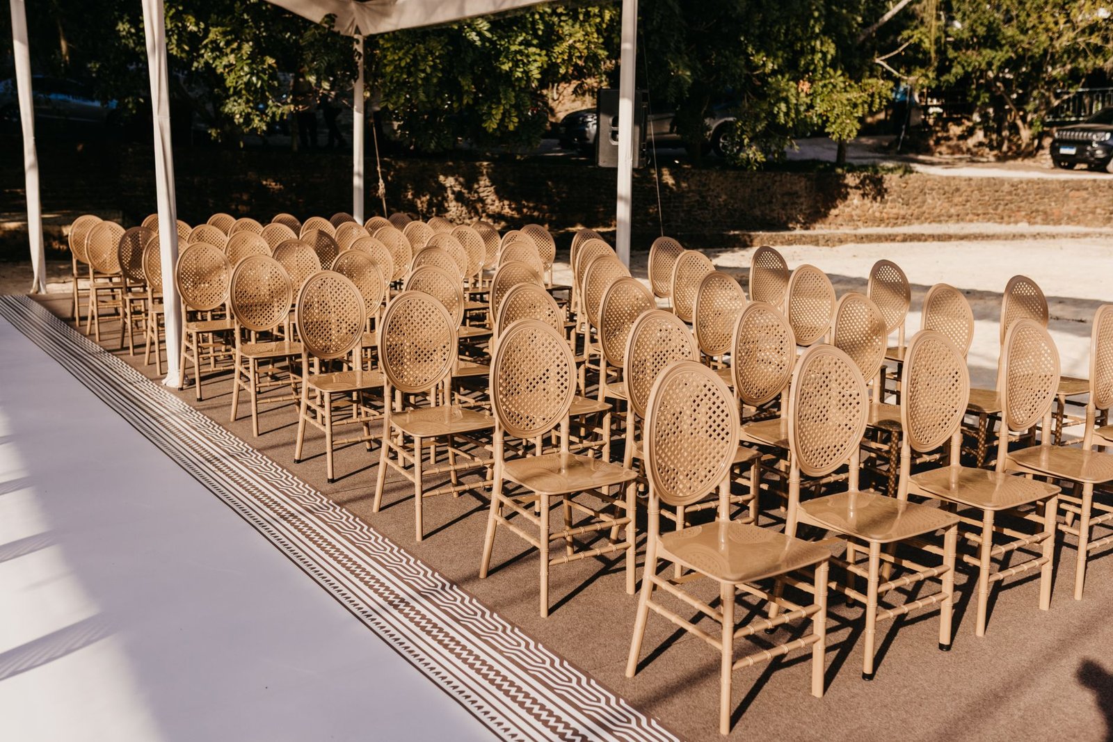 Rows of rented chairs set out before an event