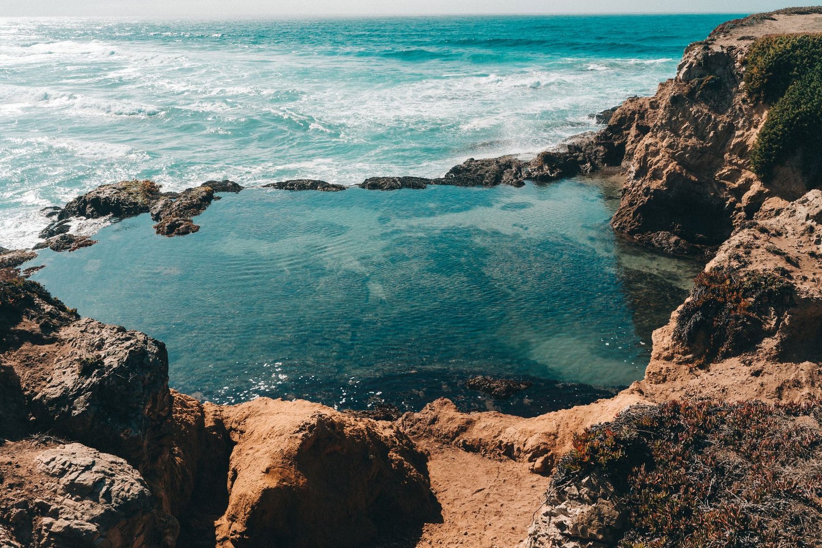 A rocky cove and clear water on the Northern California coast