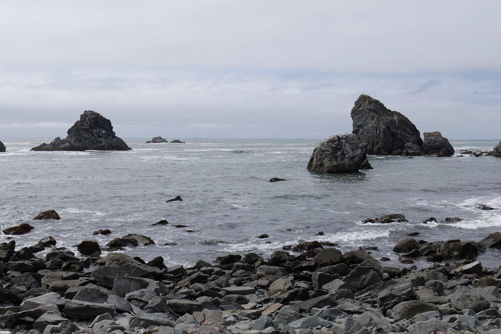 Sea stacks off a cobble beach on the Northern California coast