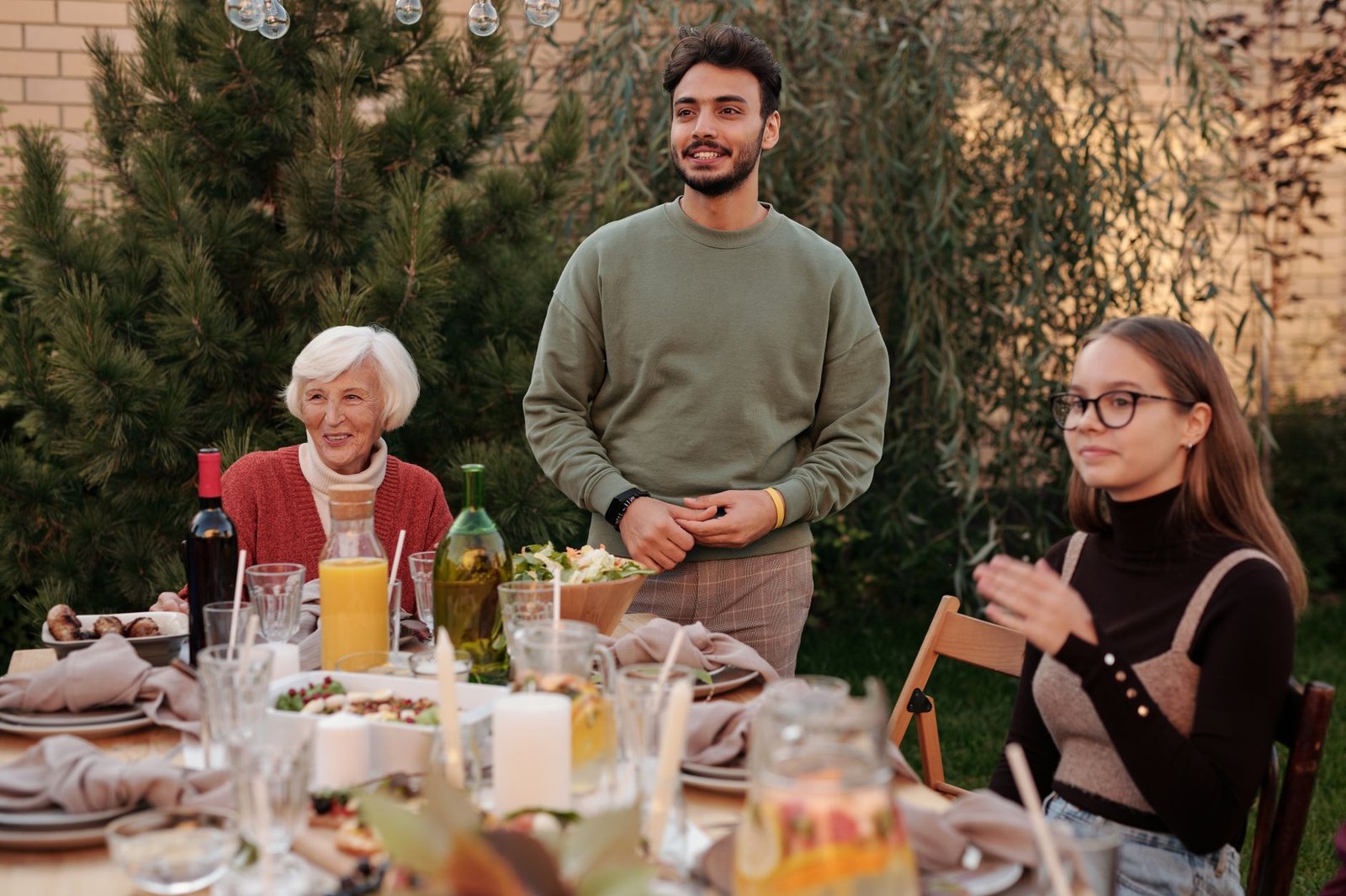 People gathered at an outdoor community dinner