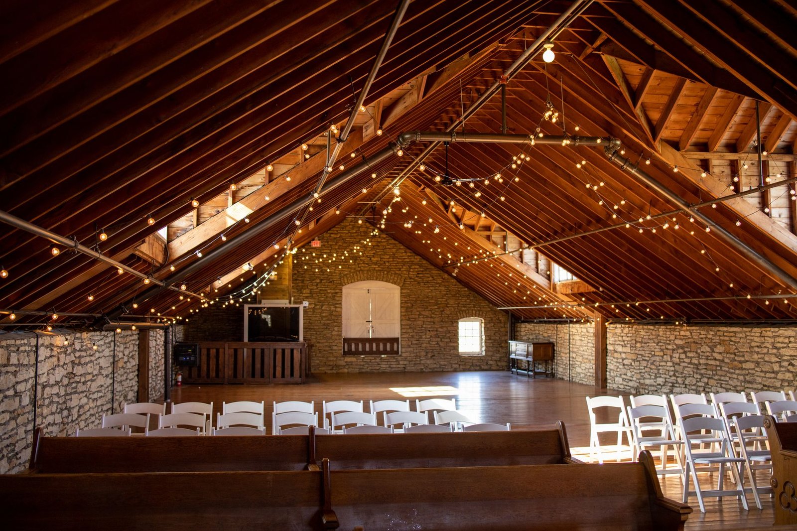 A wooden hall set up for an event
