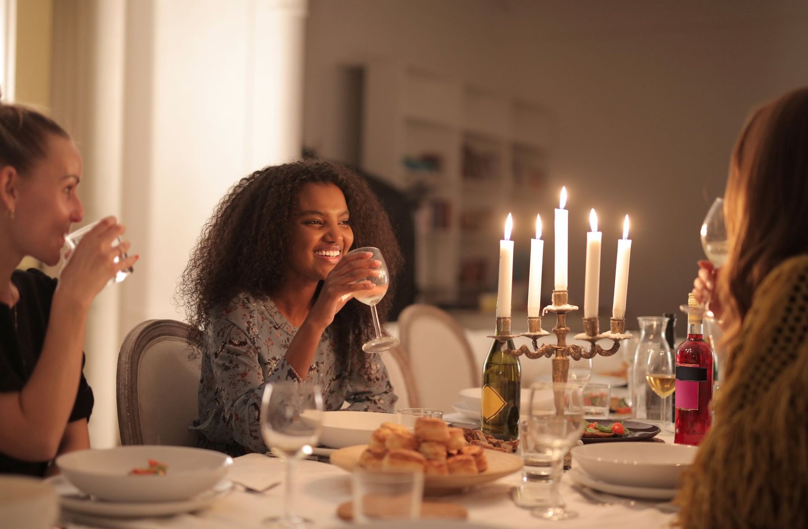 Friends together at a celebratory dinner